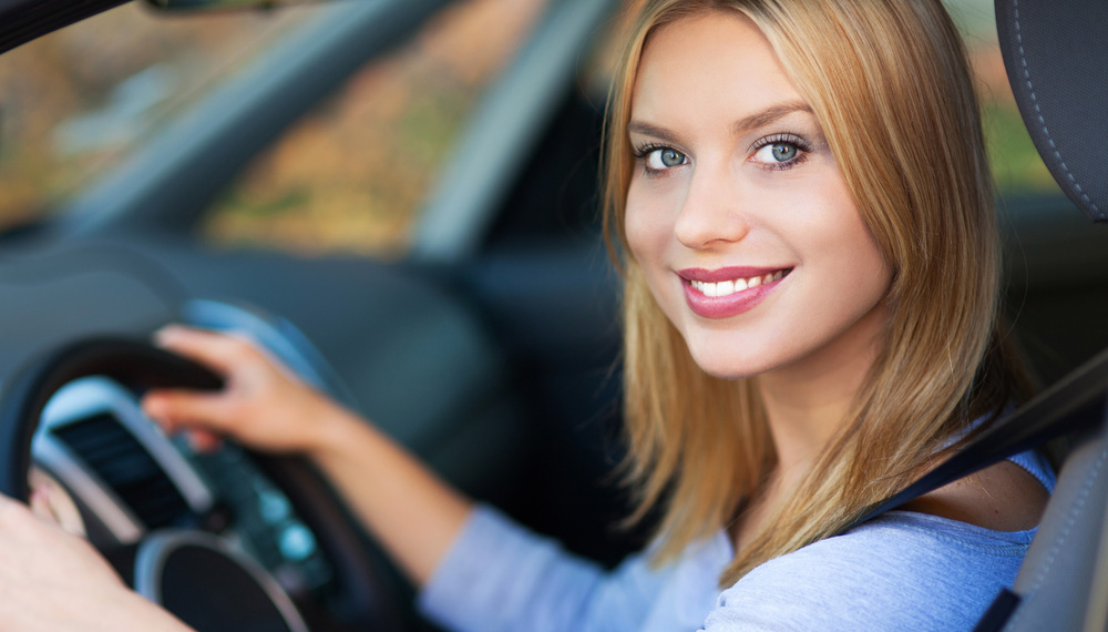 Young Woman Driving Car